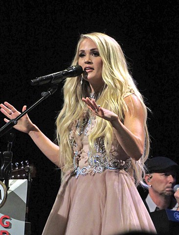 Carrie Underwood performing at the Grad Ole Opry in Nashville, Tennessee last year. (photo: darkgypsies and Wikipedia)