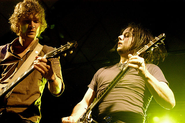 The Raconteurs' Brendan Benson and Jack White jamming together in concert at the Accelerator in Stockholm, Sweden, in 2006 (photo: Frida Borjeson and Wikipedia)