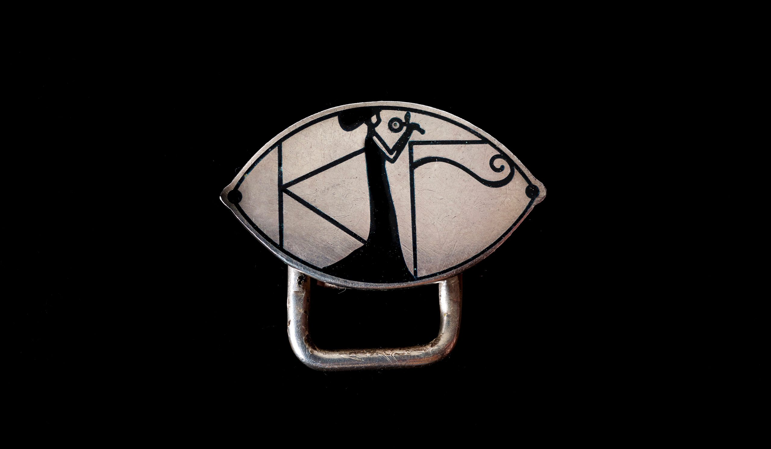 ... Meanwhile this hostess pin, made by Josef Hoffmann and Berthold Löffler in Vienna around 1903, embodied a new artistic vision. The piece wakes visual echoes of ancient times while showing a sleek modern woman in a geometric setting. (photo: John Faier, © Driehaus Museum)