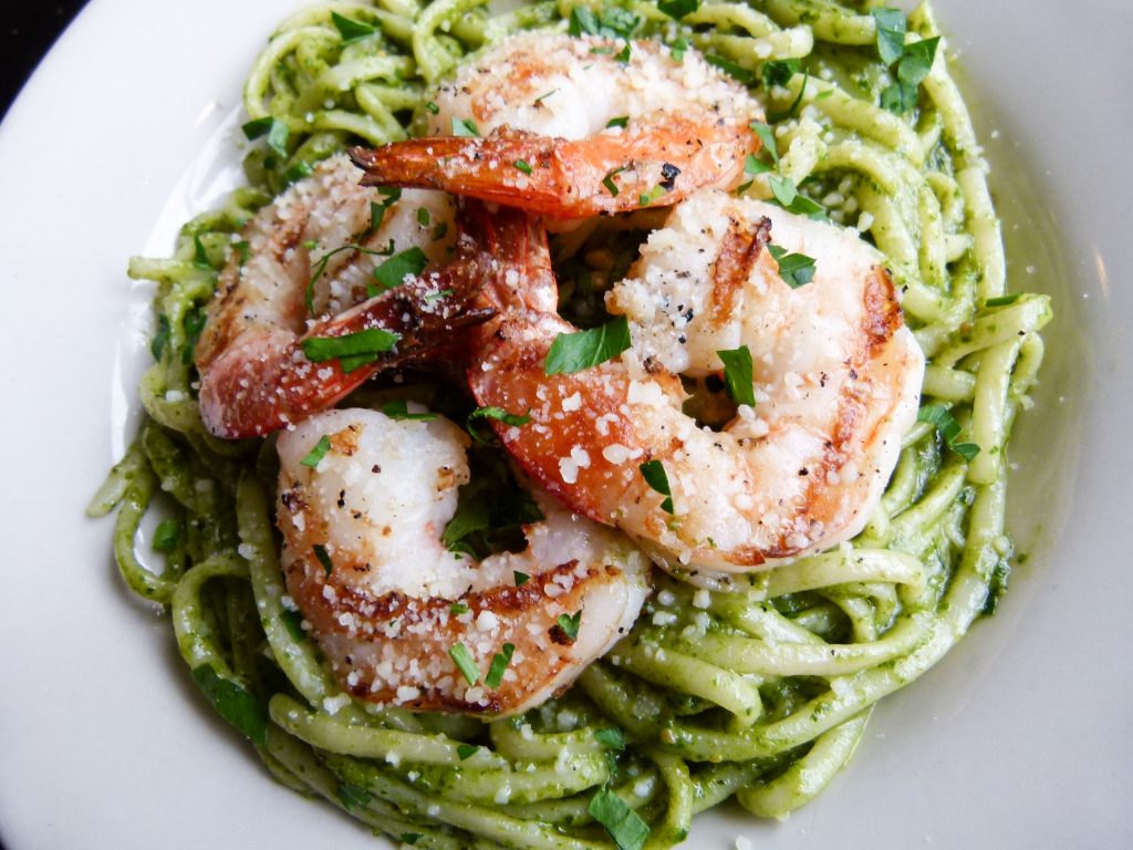Linguini with pesto sauce and grilled shrimp.