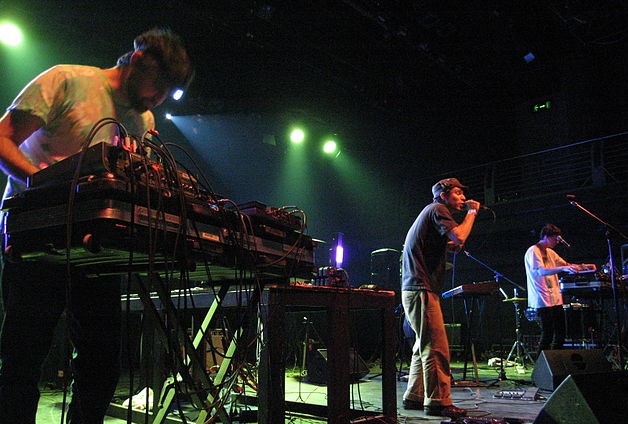 Animal Collective in a 2008 concert (l. to r.) Geologist, Avey Tare, and Panda Bear. photo: adrigu and Wikipedia.