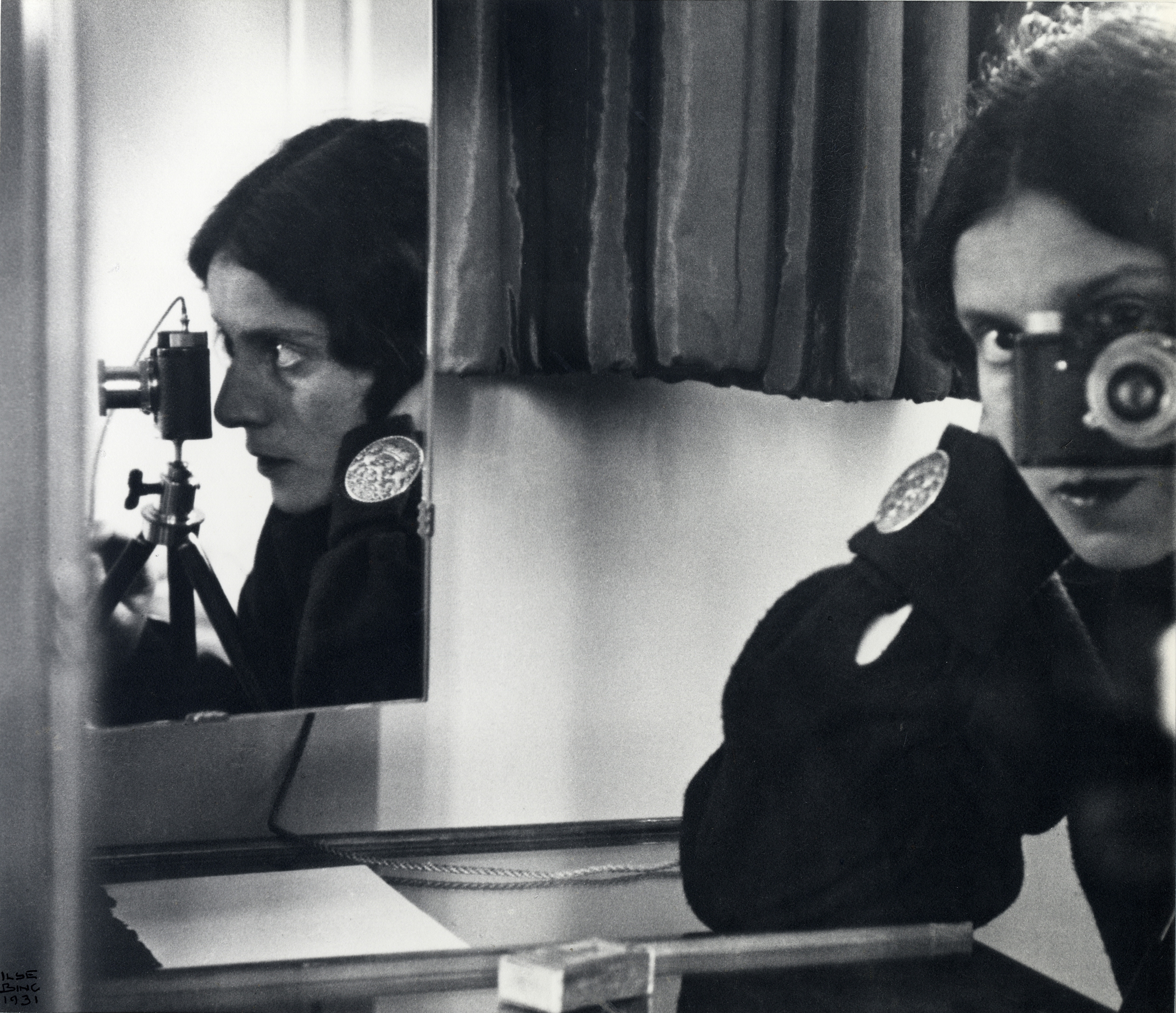 Many artists have done self-portraits in mirrors, but Ilse Bing in her doubly mirrored 'Self-Portrait with Leica' from 1931. (photo print, collection of Michael Mattis and Judith Hochberg)