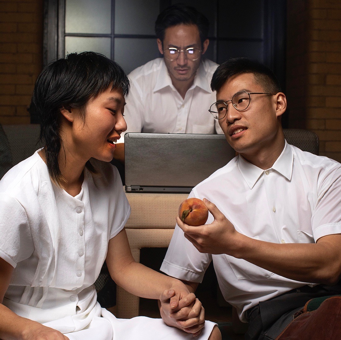 Zhang Lin (Hansel Tan, center) has flashbacks. His younger self and long-lost love come to life repeatedly, played by Tobias C. Wong and Ariel Xiu.