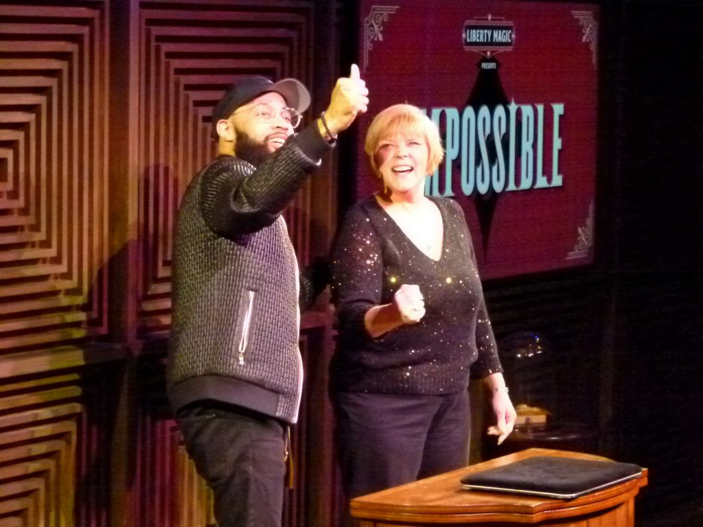 Jones and Lynne Fairman, his audience assistant, do some magic with rubber balls.