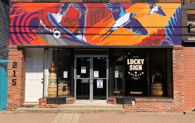 It's hard to miss Lucky Sign Spirits' colorful storefront in Millvale. (photo: Christopher Maggio)