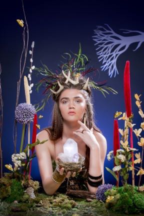 A fanciful photo of Mother Earth, created by Laura Petrilla, will be featured in Macy's Downtown windows with several others and auctioned off.