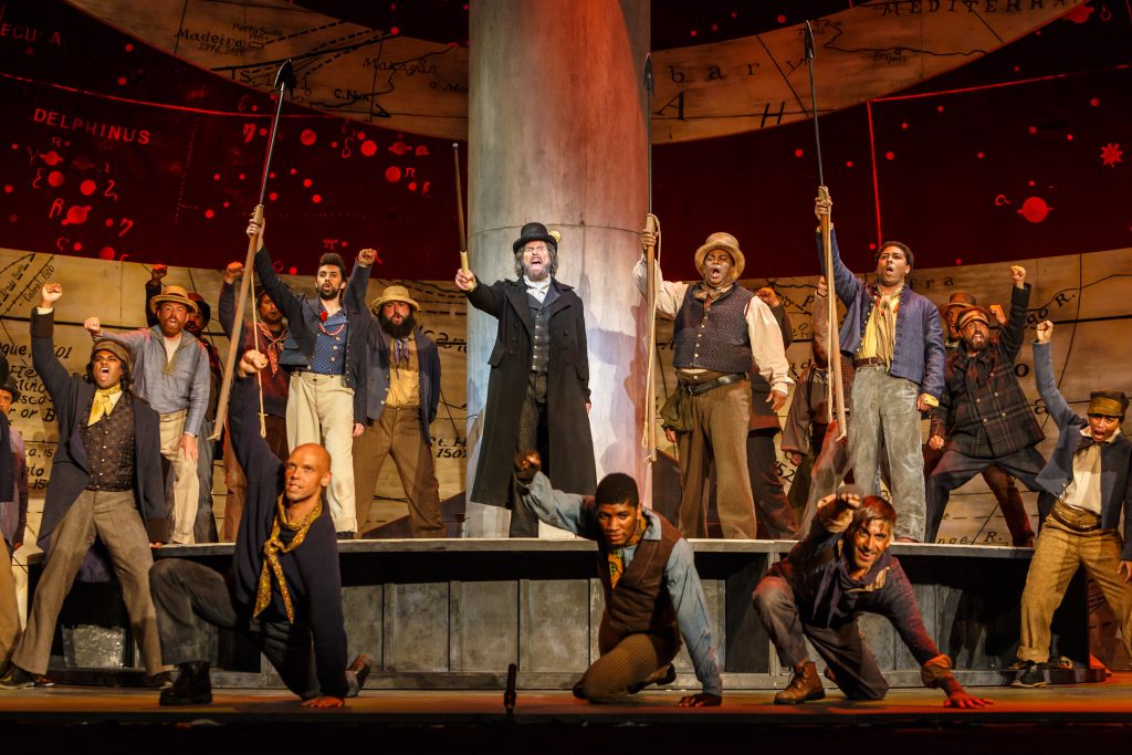 Captain Ahab (Roger Honeywell) whips the Pequod’s crew into a frenzy over the thought of killing white whale Moby-Dick in Pittsburgh Opera's stage adaptation of the book. Photo: David Bachman.