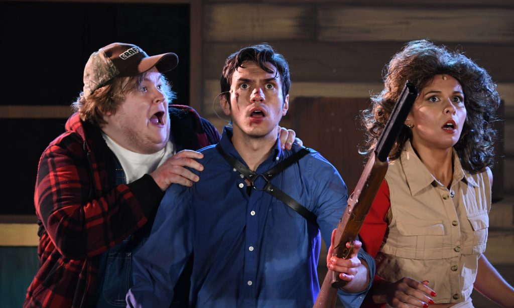 Charlie Thompson (Jake), Brett Goodnack (Ash), and Callee Miles (Annie) are on the lookout for more evil occurrences in PMT's 'Evil Dead: The Musical.'