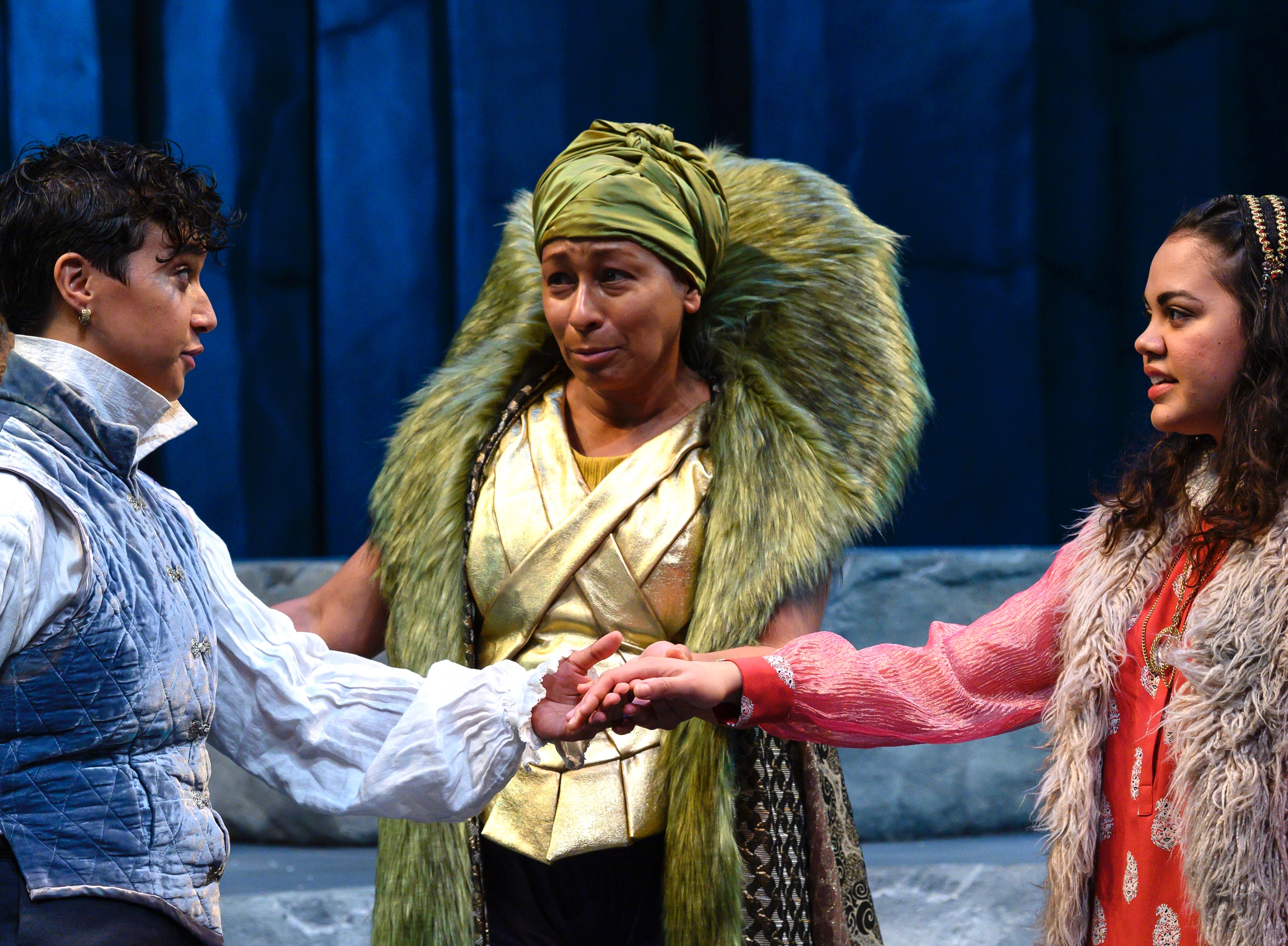 O brave new world, that has such a sweet guy in't! Looks like Prospero (Tamara Tunie, center) might give her blessing to the union of Ferdinand and Miranda (Rad Pereira and Kerry Warren) in 'The Tempest' at The Public.