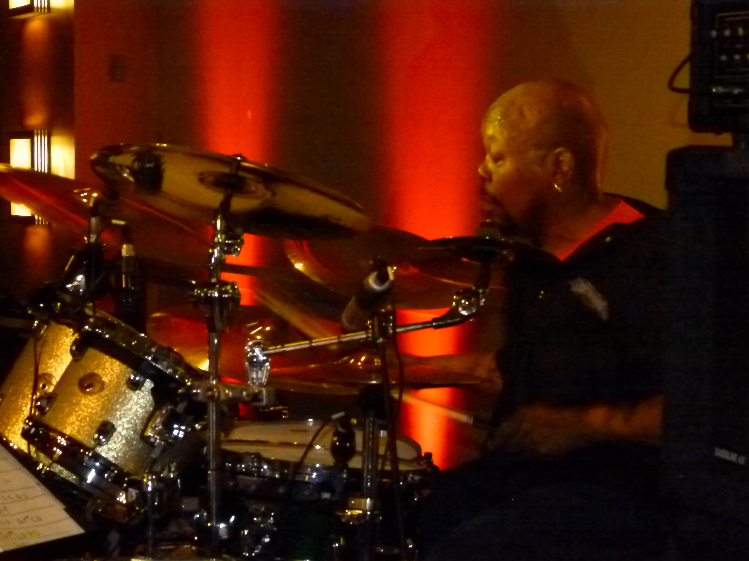 The Houserockers' drummer Jeffrey "Joffo" Simmons with his sticks a blazin'.