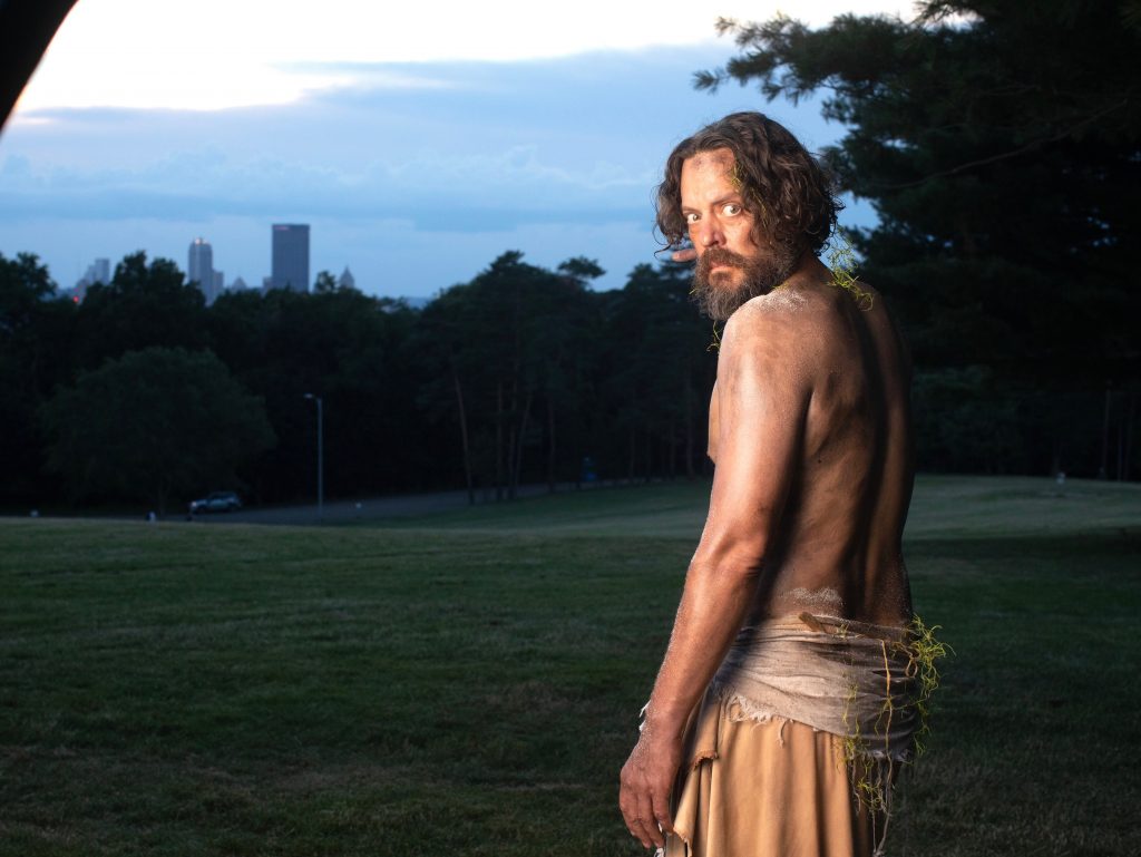 Weary Odysseus (Sam Turich) longs for Ithaca but will find his tale retold from an unconventional angle in Quantum's 'An Odyssey.' The season-opening play is presented in Schenley Park above the faraway spires of Downtown. (photo: Jason Snyder)