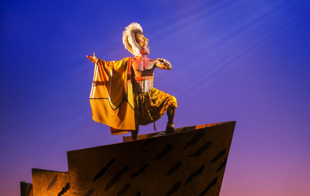 It's a tricky climb to the top of Pride Rock, but Simba aims to claim his rightful place. (photo: Deen van Meer, © Disney)