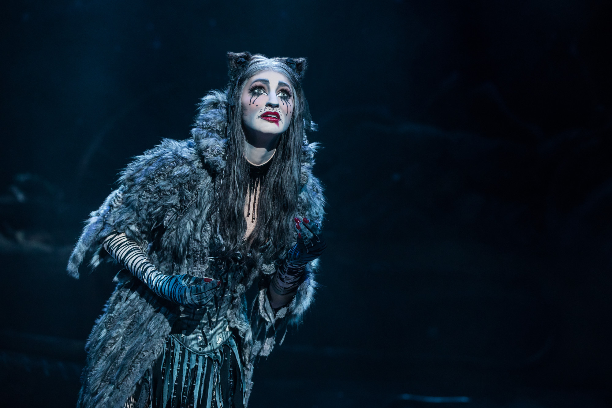 If you've had them, you know that cats can be very guilt-inducing when they desire attention, as Grizabella does here in 'Cats.' (photo: Matthew Murphy)
