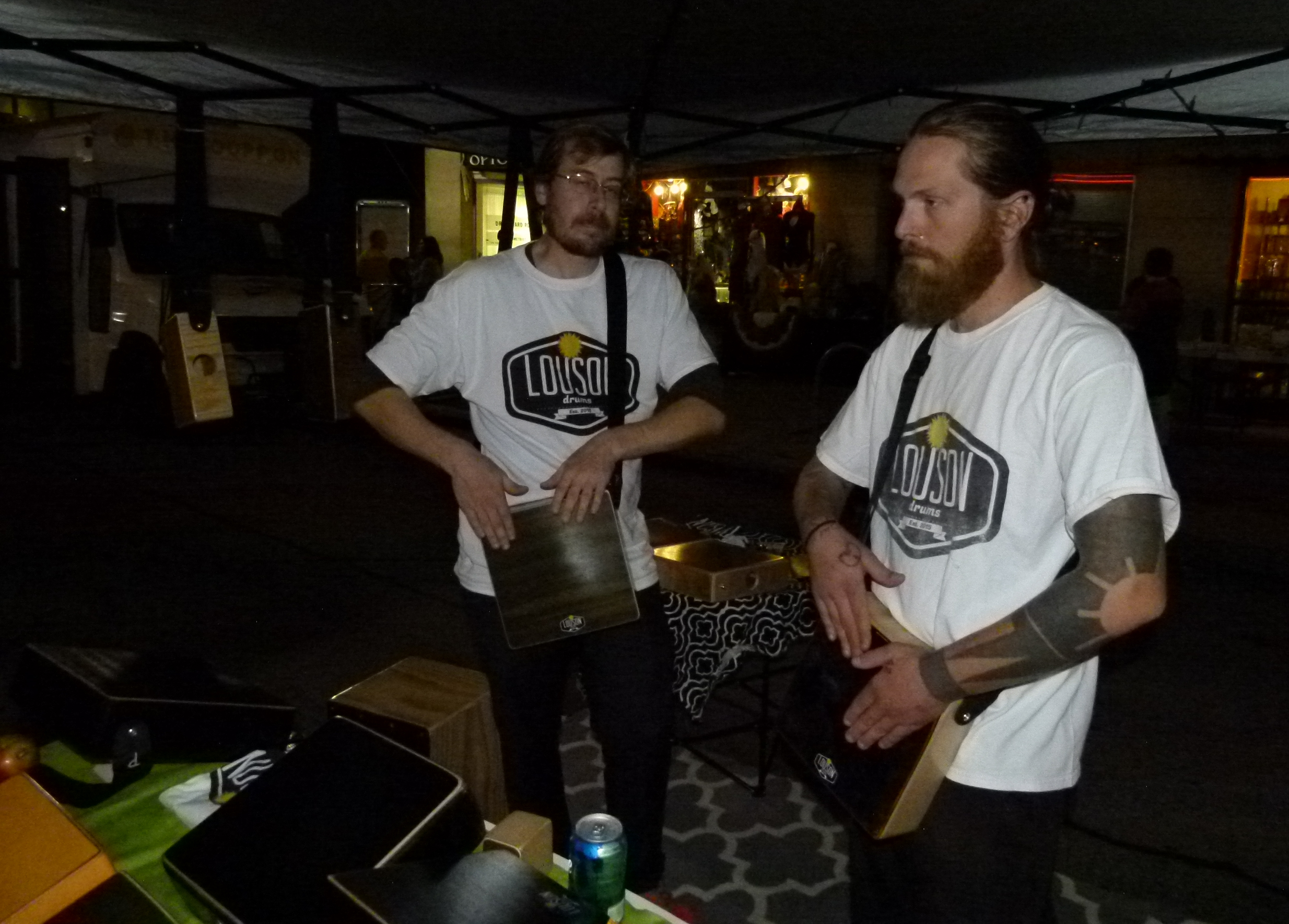 Carson Cashman (l.) and Lou Manione (r.) play cajon tablets. Their Louson CajonTabs are custom made and modeled on a Peruvian percussion instrument.