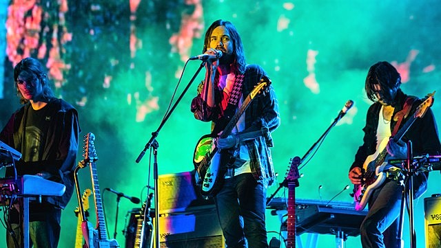 Australian Kevin Parker's musical project Tame Impala seen here performing at the Flow Festival in Helsinki, Finland in 2019. (photo: Raph_PH and Wikipedia)