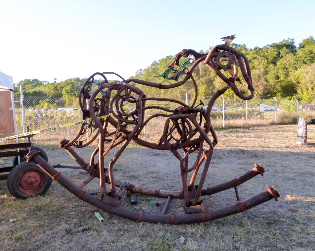 An iron art rocking horse.