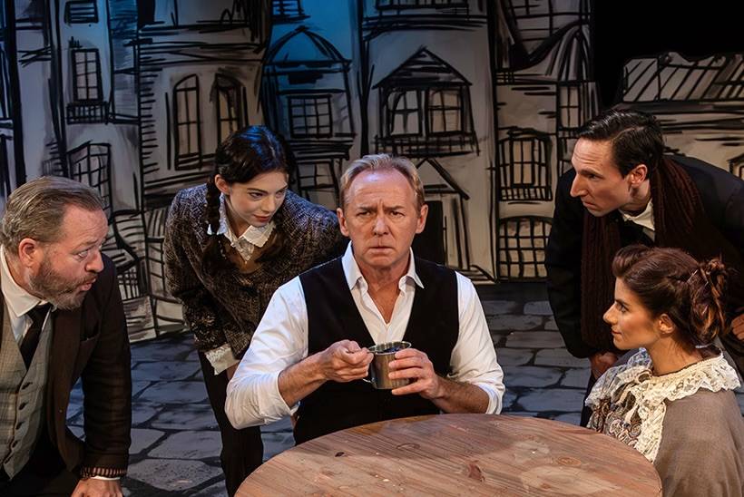 Bah! Humbug! Sherlock Holmes (David Whalen, center) is the toast of London but he's not feeling it. His concerned neighbors are played by (L to R) Simon Bradbury, Carolyn Jerz, Joseph McGranaghan, and Caroline Nicolian.