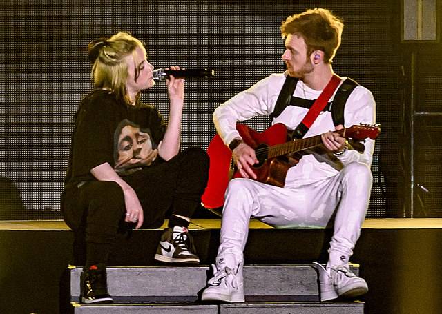 Billie Eilish and her brother, and longtime collaborator, Finneas O'Connell at ALT 98.7 FM's "ALTer EGO" concert at The Forum in Los Angeles in 2020. (Photo: Justin Higuchi and Wikipedia)